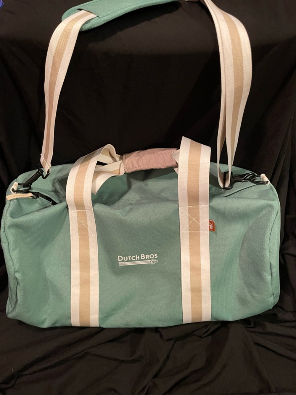 Dutch Bros Mint Green Duffel Bag with Cream Straps